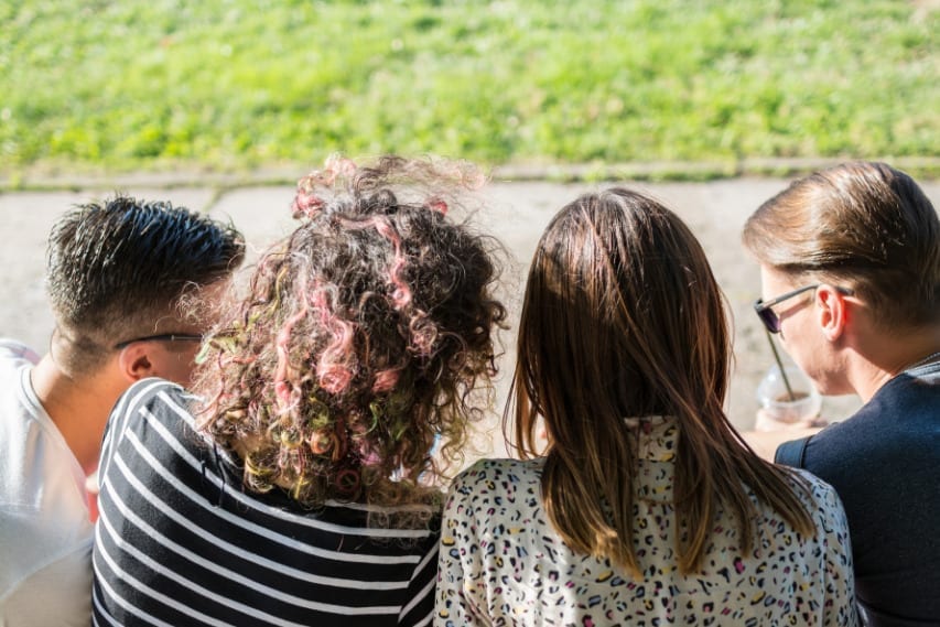 group of friends sitting talking